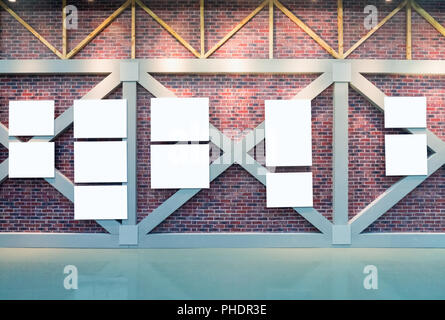 blank frames on brick wall Stock Photo