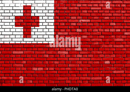 flag of Tonga painted on brick wall Stock Photo