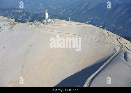 AERIAL VIEW. Barren summit of Mont Ventoux with its trademark of white limestone rocks. Bédoin, Vaucluse, Provence-Alpes-Côte d'Azur, France. Stock Photo