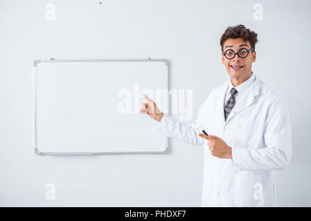 Funny doctor scientist making presentation in hospital Stock Photo