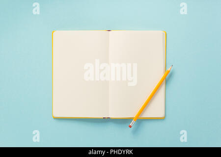 notebook and school accessories at abstract background surface Stock Photo