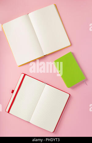 notebook and school accessories at abstract background surface Stock Photo