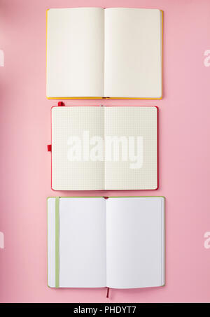 notebook and school accessories at abstract background surface Stock Photo