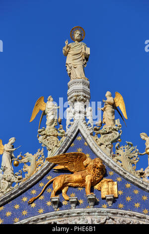 Saint Mark, angels and lion on top of Basilica Stock Photo