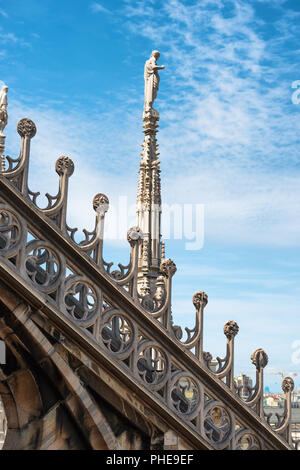 Statues on the roof of famous Milan Cathedral Duomo Stock Photo