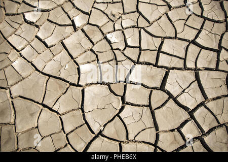 Cracked soil of desert Stock Photo