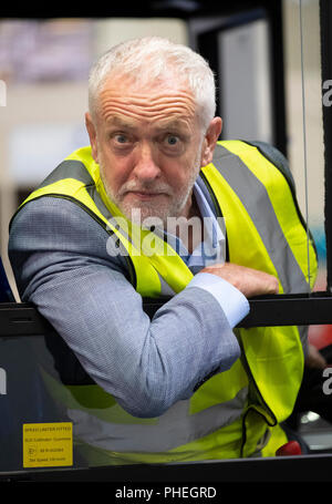 Falkirk, Scotland, UK; 20 August, 2018. Labour Leader Jeremy Corbyn and Scottish Labour Leader Richard Leonard visit Alexander Dennis bus manufacturer Stock Photo