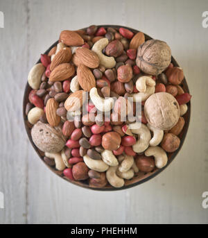 Assorted nuts in bowl Stock Photo