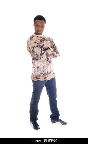 African man standing in jeans and sweater Stock Photo