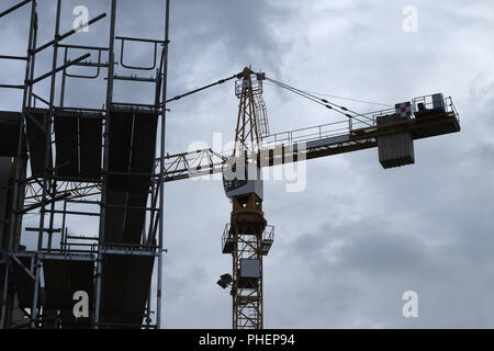 Construction crane on building site Stock Photo