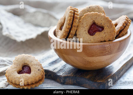 Homemade Linzer cookies with strawberry jam. Stock Photo