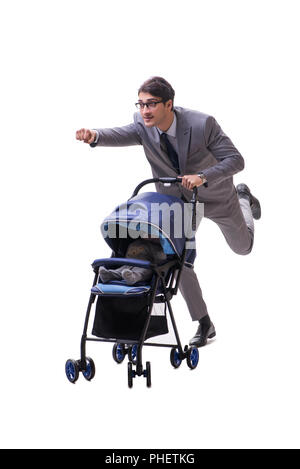 Young businessman nursing child in pram isolated on white Stock Photo