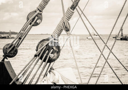 Blocks and rigging of an old sailboat, close-up Stock Photo