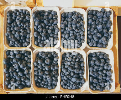 top down view on boxes of blue blueberries Stock Photo