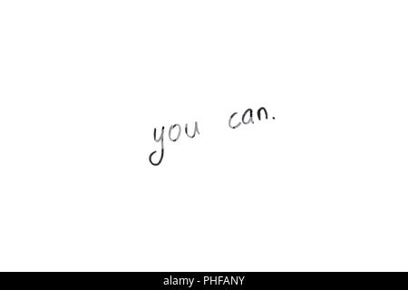 Handwritten text 'you can' on a white background. Isolate. Stock Photo