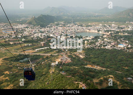 Cable car (ropeway) to Savitri Mata temple with scenic view over Pushkar, Rajasthan, India Stock Photo