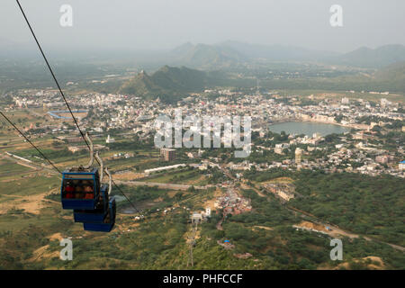 Cable car (ropeway) to Savitri Mata temple with scenic view over Pushkar, Rajasthan, India Stock Photo