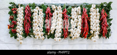 Food ingredients - garlic, chili pepper and laurel leaf in italian flag colors Stock Photo