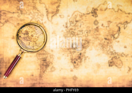 Old map with an magnifying glass Stock Photo - Alamy