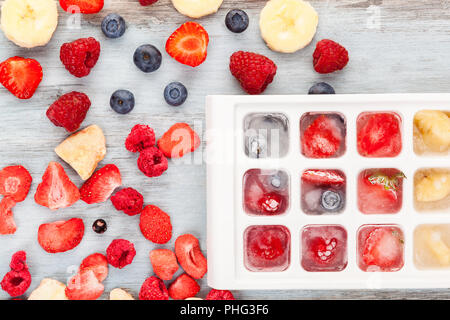 Freeze dried, fresh and frozen berry fruits from above. Stock Photo