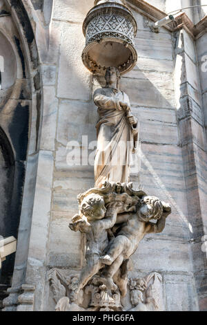 Statues on the roof of famous Milan Cathedral Duomo Stock Photo