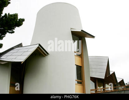 Detail of the Maggies Cancer Care Centre which stands in the grounds of Ninewells hospital in Dundee, Scotland. The distinctive tower and quirky roof is the work of the great American architect; Frank Gehry. The centre offers some respite for women who have been diagnosed with cancer. Stock Photo