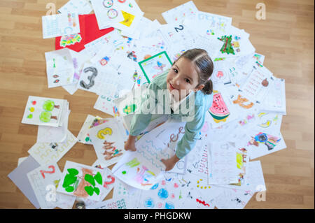 Five years student over her whole year homework. Homework overload for kids  concept Stock Photo - Alamy
