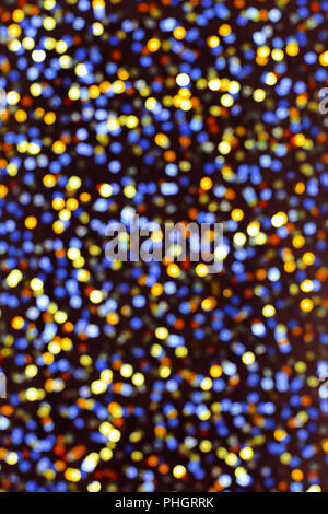 Background of blured glittering colored circles Stock Photo