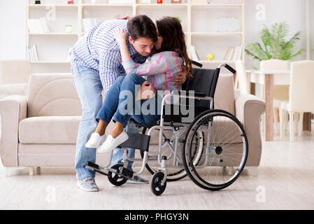 Young family taking care of each other Stock Photo