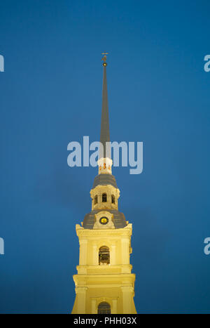 Spire of the Peter and Paul Cathedral Illuminated in the Evening, Saint Petersburg, Russia Stock Photo
