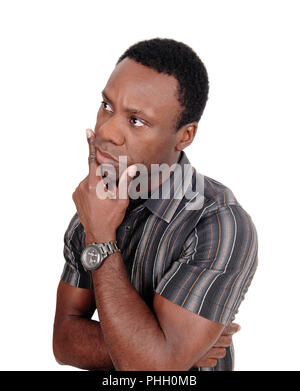 Portrait of thinking African man with hand on chin Stock Photo