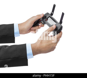 Wireless Remote Man A man with a remote control in his hands. Controlling the flight of the ...