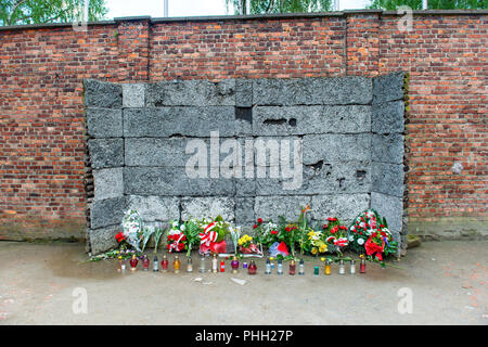 Memorial at Death Wall in Auschwitz Stock Photo