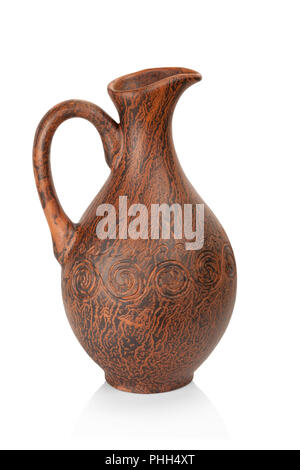 Clay jug isolated on white background made with kefir burn technique Stock Photo