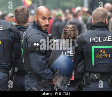 Chemnitz, Germany. 01st Sep, 2018. 01.09.2018, Saxony, Chemnitz: Policemen accompany the demonstration of AfD and the xenophobic alliance Pegida, to which also the participants of the rally of the right-wing populist citizen movement Pro Chemnitz have joined. Credit: Boris Roessler/dpa/Alamy Live News