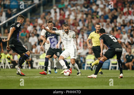 Santiago Bernabeu, Madrid, Spain. 1st Sep, 2018. La Liga football, Real Madrid versus Leganes; Karim Benzema (Real Madrid) drives forward on the ball challenged by Jonathan Silva (Leganes FC) Credit: Action Plus Sports/Alamy Live News Stock Photo