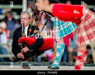 01/09/2018. Braemar, United Kingdom. The Queen attends the Braemar Gathering. Scottish Dancing  at the Braemar Gathering Games begin before HM Queen Elizabeth II joined by  Prince Charles, Prince of Wales, Camilla, The Duchess of Cornwall and Princess Anne, attend The Braemar Royal Gathering in the Scottish Highlands.  Picture by Andrew Parsons / Parsons Media Credit: andrew parsons/Alamy Live News Stock Photo