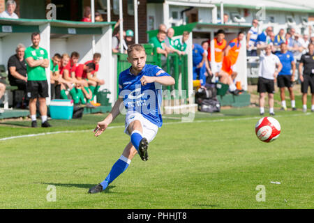 East Riding of Yorkshire, UK. 01 September 2018 - North Ferriby United A.F.C in the East Riding of Yorkshire, England, known as The Villagers and playing in green, hosted a match against Warrington Town AFC, known as The Yellows and The Wire and playing in blue, Both clubs play in the Evo Stik Northern Premier League Premier Division, the seventh tier of English football. Credit: John Hopkins/Alamy Live News Stock Photo