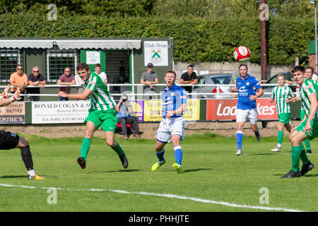 East Riding of Yorkshire, UK. 01 September 2018 - North Ferriby United A.F.C in the East Riding of Yorkshire, England, known as The Villagers and playing in green, hosted a match against Warrington Town AFC, known as The Yellows and The Wire and playing in blue, Both clubs play in the Evo Stik Northern Premier League Premier Division, the seventh tier of English football. Credit: John Hopkins/Alamy Live News Stock Photo