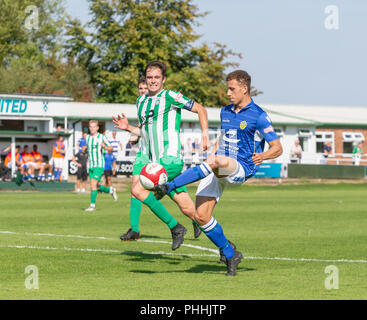 East Riding of Yorkshire, UK. 01 September 2018 - North Ferriby United A.F.C in the East Riding of Yorkshire, England, known as The Villagers and playing in green, hosted a match against Warrington Town AFC, known as The Yellows and The Wire and playing in blue, Both clubs play in the Evo Stik Northern Premier League Premier Division, the seventh tier of English football. Credit: John Hopkins/Alamy Live News Stock Photo