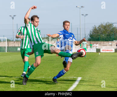 East Riding of Yorkshire, UK. 01 September 2018 - North Ferriby United A.F.C in the East Riding of Yorkshire, England, known as The Villagers and playing in green, hosted a match against Warrington Town AFC, known as The Yellows and The Wire and playing in blue, Both clubs play in the Evo Stik Northern Premier League Premier Division, the seventh tier of English football. Credit: John Hopkins/Alamy Live News Stock Photo