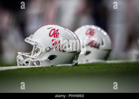 Houston, Texas, USA. 1st Sep, 2018. Ole Miss helmets rest on the field prior to the NCAA football game between the Texas Tech Red Raiders and the Ole Miss Rebels in the 2018 AdvoCare Texas Kickoff at NRG Stadium in Houston, Texas. Prentice C. James/CSM/Alamy Live News Stock Photo