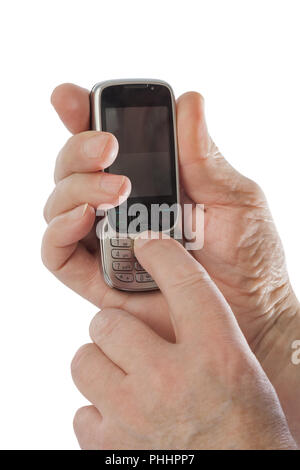 Hands of old man with old mobile phone Stock Photo