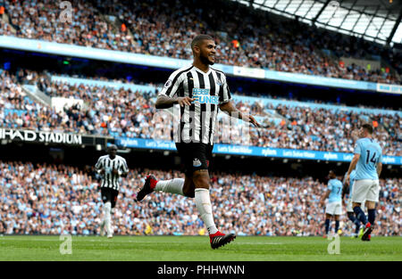 Newcastle United's DeAndre Yedlin celebrates scoring his side's first goal of the game during the Premier League match at the Etihad Stadium, Manchester. Stock Photo