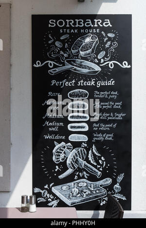 Steak doneness guide at Sorbara Steak House in Ljubljana, Slovenia Stock Photo