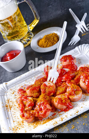 curry bockwurst with beer Stock Photo