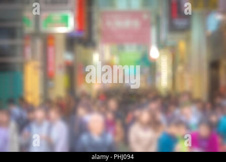 Abstract blurred people in shopping mall. Urban lifestyle background. Stock Photo