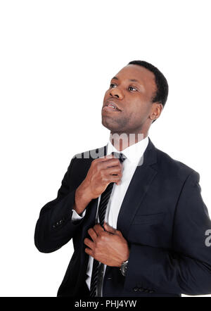 African business man fixing his tie Stock Photo