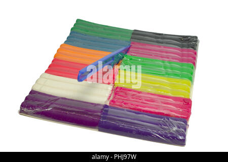 plasticine isolated ; multicolored set with unusual fluorescent features and simple modeling tool Stock Photo