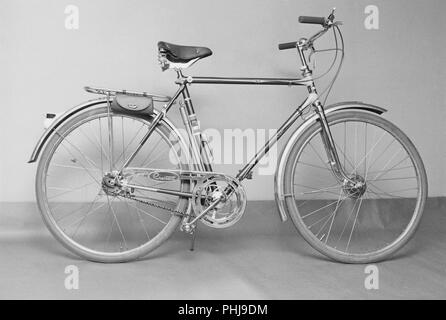 1950s bicycle. An exclusive model for men made by Swedish manufacturer Nymanbolaget for the brand Crescent. It has drum breaks on the front wheel, three gears, practical leather case for tools and a holder for the bicycle pump. The company marketed itself as producing the World champion bike. Sweden 1956 Stock Photo